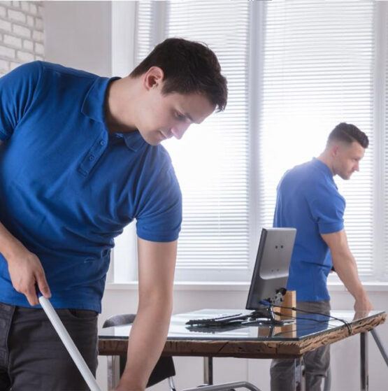 Men are cleaning the office